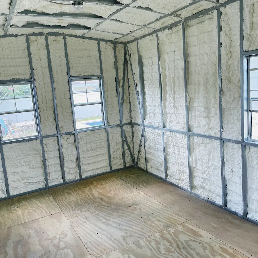 Closed-cell spray foam insulation applied to wall cavities in a residential project in La Grange